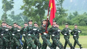 Fuerzas femeninas participan en el ensayo (Foto: VNA)
