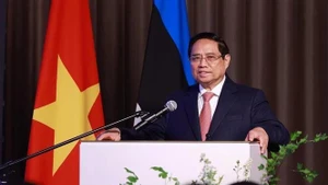 El primer ministro de Vietnam, Pham Minh Chinh, habla en el evento. (Foto: VNA)