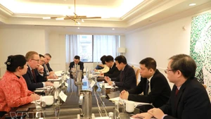 En la reunión (Foto: VNA)