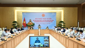 Escena del evento (Foto: Nhan Dan)