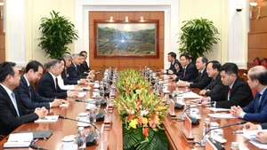 [Foto] Jefe de la Comisión de Propaganda y Movilización de Masas del Partido Comunista de Vietnam recibe a su homólogo de China