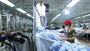 Producción de textiles para la exportación. (Foto: VNA)