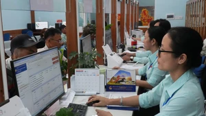 Las habilidades digitales son una "llave" importante para ayudar a los funcionarios públicos a resolver su trabajo de la manera más eficiente. (Foto: VNA)