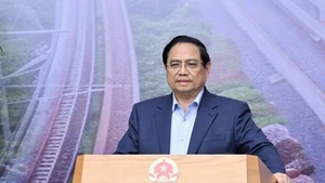 El primer ministro Pham Minh Chinh habla en la cita (Foto: VNA)