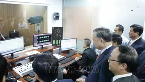 [Foto] Secretario general To Lam visita Voz de Vietnam por Año Nuevo Lunar 