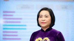 La vicepresidenta de la Asamblea Nacional y miembro del Consejo Electoral Nacional (CEN), Nguyen Thi Thanh, en declaración ante la prensa. 