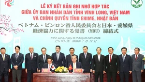 En el acto de firma. (Foto: Nhan Dan)