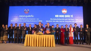 En la conferencia. (Foto: VNA)