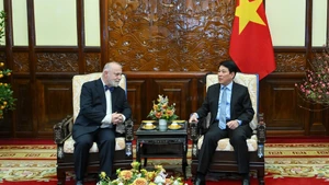 Escena de la reunión. (Foto: Nhan Dan)