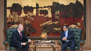 Escena de la reunión. (Foto: Nhan Dan)