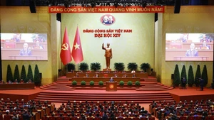 En la sesión de clausura del XIV Congreso Nacional del Partido Comunista de Vietnam. (Foto: VNA)