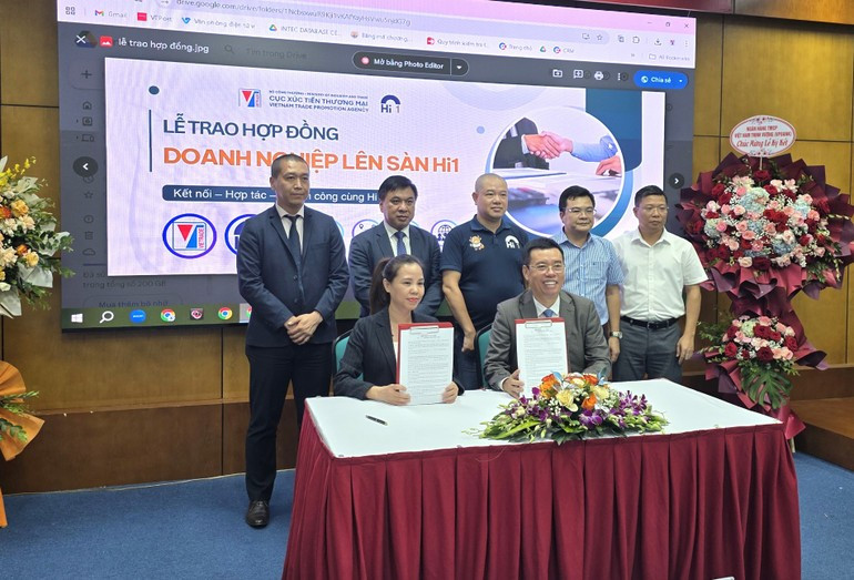 El acto de firma de un memorando de entendimiento entre el Centro de Apoyo a la Promoción Comercial e Inversión y la Empresa Hi1 Vietnam S.A. El acto de firma de un memorando de entendimiento entre el Centro de Apoyo a la Promoción Comercial e Inversión y la Empresa Hi1 Vietnam S.A.