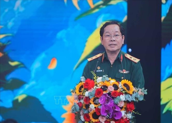 El teniente general Nguyen Huu Chinh, presidente de la VAVA, interviene en la cita (Foto: VNA) El teniente general Nguyen Huu Chinh, presidente de la VAVA, interviene en la cita (Foto: VNA)