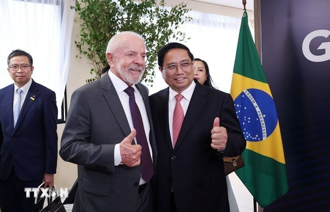 El primer ministro vietnamita, Pham Minh Chinh, y el presidente brasileño, Luis Inácio Lula da Silva. (Fuente: VNA) El primer ministro vietnamita, Pham Minh Chinh, y el presidente brasileño, Luis Inácio Lula da Silva. (Fuente: VNA)