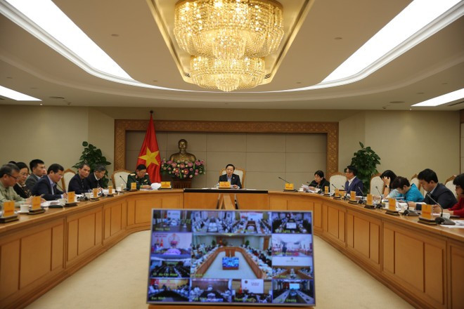 En la reunión. (Foto: VNA)