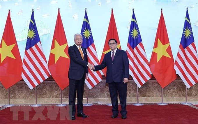 El primer ministro de Vietnam, Pham Minh Chinh, y su homólogo de Malasia, Dato Sri Ismail Sabri bin Yaakob. (Fotografía: VNA)
