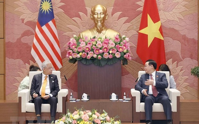 El presidente de la Asamblea Nacional de Vietnam, Vuong Dinh Hue, y el primer ministro de Malasia, Dato’ Sri Ismail Sabri bin Yaakob. (Fotografía: VNA)