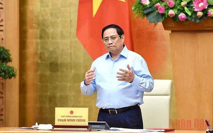 El primer ministro de Vietnam, Pham Minh Chinh, interviene en la reunión. (Fotografía: Nhan Dan)