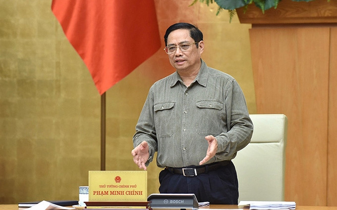 El primer ministro de Vietnam, Pham Minh Chinh habla en el evento. (Fotografía: Nhan Dan)