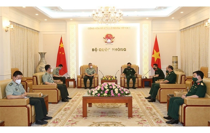 En la reunión. (Fotografía: bienphong.com.vn)