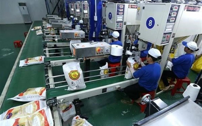 La industria de confecciones de Laos. (Fotografía: VNA)