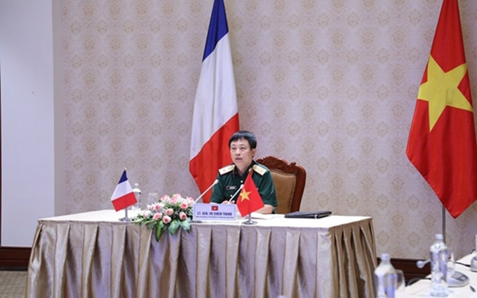 El teniente general Vu Chien Thang, jefe del Departamento de Relaciones Exteriores, en la reunión.