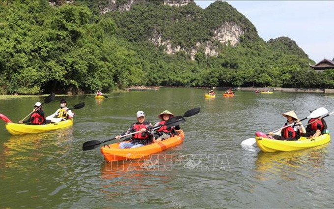 En el Conjunto de Paisajes Escénicos de Trang An (Foto: VNA)