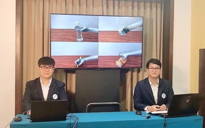 Pham Duc Linh y Nguyen Duc Anh en el concurso (Foto: Comité organizador)