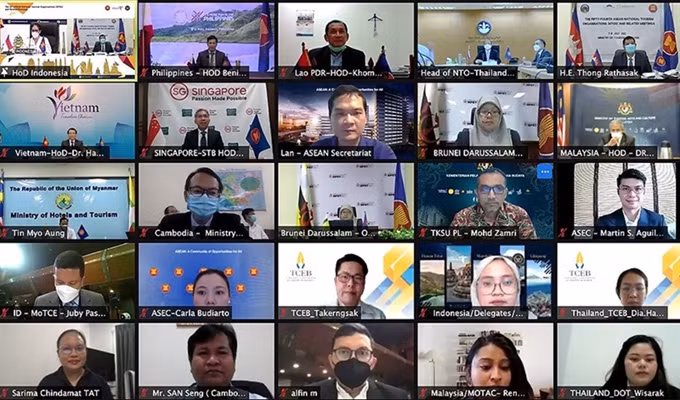 Asistentes a la reunión. (Fotografía: baovanhoa.vn)