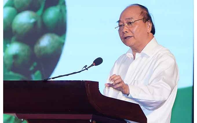 El primer ministro de Vietnam, Nguyen Xuan Phuc interviene en el evento. (Fotografía: VGP)