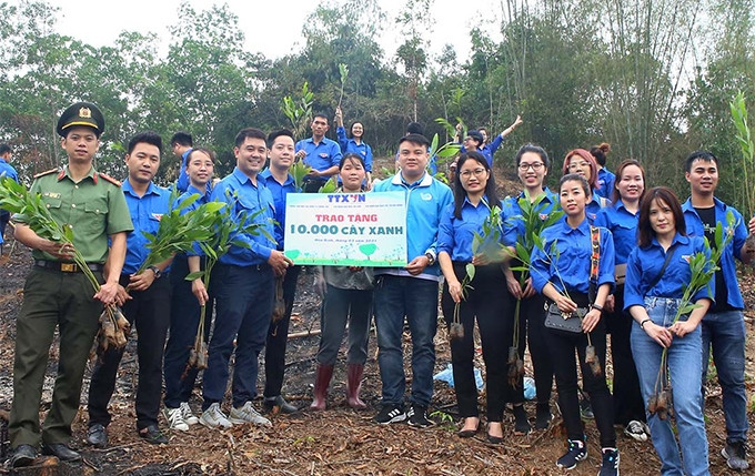 Jóvenes vietnamitas en una actividad de protección ambiental. (Fotografía: VNA)