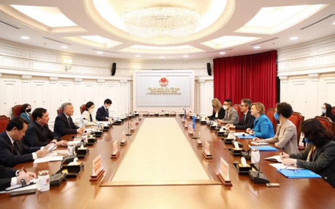 Escena de la reunión (Foto: VNA)