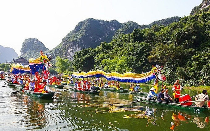 La carrera de botes de dragón en el Festival. (Fotografía: Vntrip)