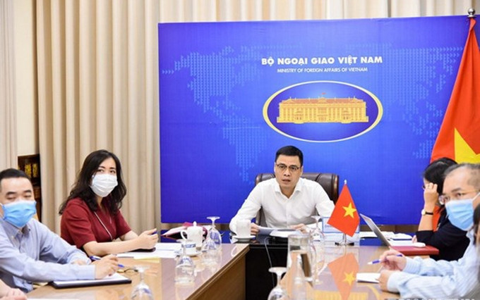 En la reunión. (Fotografía: baoquocte.vn)
