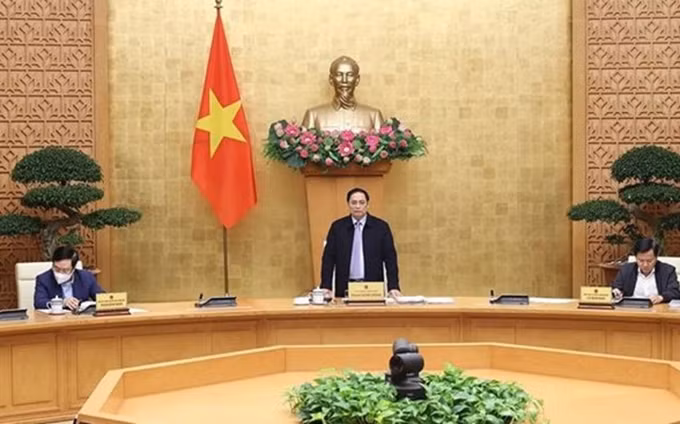 El primer ministro Pham Minh Chinh habla en la reunión. (Fotografía: VNA)