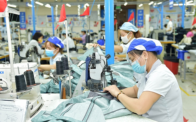 En la Corporación de Prendas de Vestir 10. (Fotografía: nhandan.com.vn)