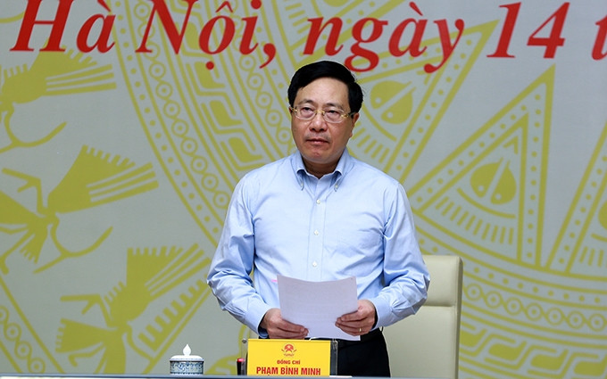 El miembro del Buró Político y viceprimer ministro permanente de Vietnam, Pham Binh Minh, preside el evento. (Fotografía: VGP)
