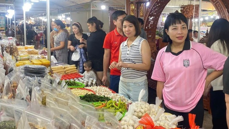 Visitantes a la feria.