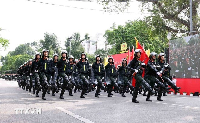 El desfile de la unidad de Policía de Operaciones Especiales. (Foto: VNA) El desfile de la unidad de Policía de Operaciones Especiales. (Foto: VNA)