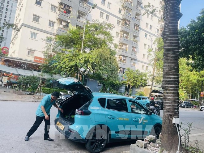 Un taxi eléctrico en Hanói. (Foto: VNA) Un taxi eléctrico en Hanói. (Foto: VNA)