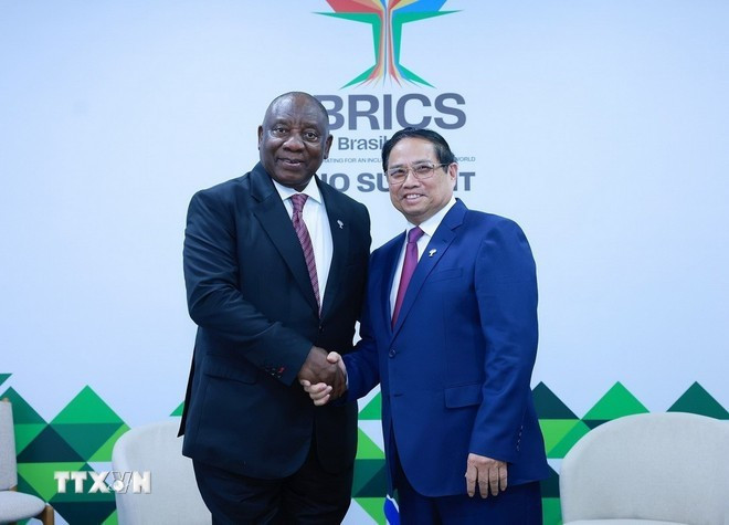 El primer ministro Pham Minh Chinh se reúne con el presidente sudafricano Cyril Ramaphosa en el marco de la Cumbre BRICS 2025 en Río de Janeiro, Brasil (Foto: VNA) El primer ministro Pham Minh Chinh se reúne con el presidente sudafricano Cyril Ramaphosa en el marco de la Cumbre BRICS 2025 en Río de Janeiro, Brasil (Foto: VNA)