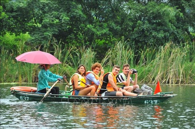 Turistas extranjeros en Vietnam. (Foto: VNA)