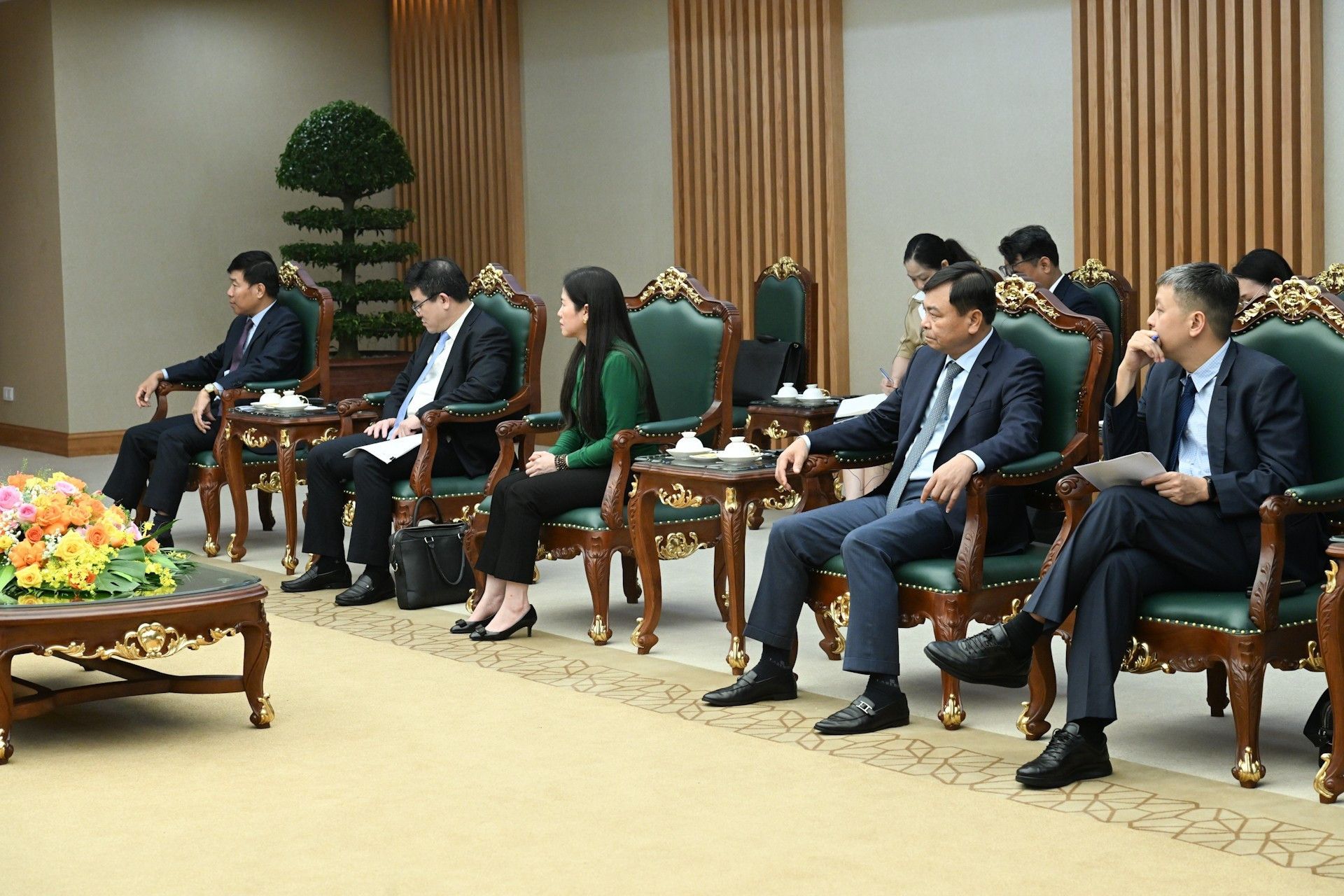 Asistentes vietnamitas en el encuentro.