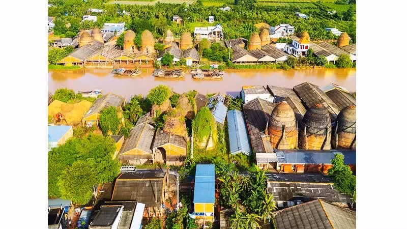 Una imagen que refleja el característico ritmo de vida de los pueblos artesanales del delta del Mekong.