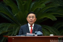 El integrante del Buró Político y miembro permanente del Secretariado del Comité Central del Partido Comunista de Vietnam, Tran Cam Tu, interviene en la conferencia. (Foto: Nhan Dan)