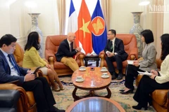 Escena de la reunión. (Foto: Nhan Dan)