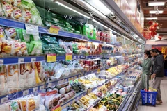 Clientes en el supermercado Coopmart Nguyen Trai en Hanói. (Foto: VNA)