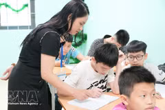 Una clase dedicada a niños con discapacidades auditivas y del habla en la provincia de Bac Ninh. (Foto: VNA)