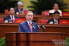 El secretario general To Lam.