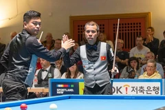 Tran Quyet Chien (derecha) y Nguyen Tran Thanh Tu, campeones mundiales por equipos en 2026. (Foto: UMB).